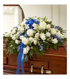 Accents of Blue Funeral Casket Spray  Send to Philippines