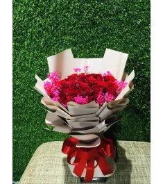 24 red roses in bouquet